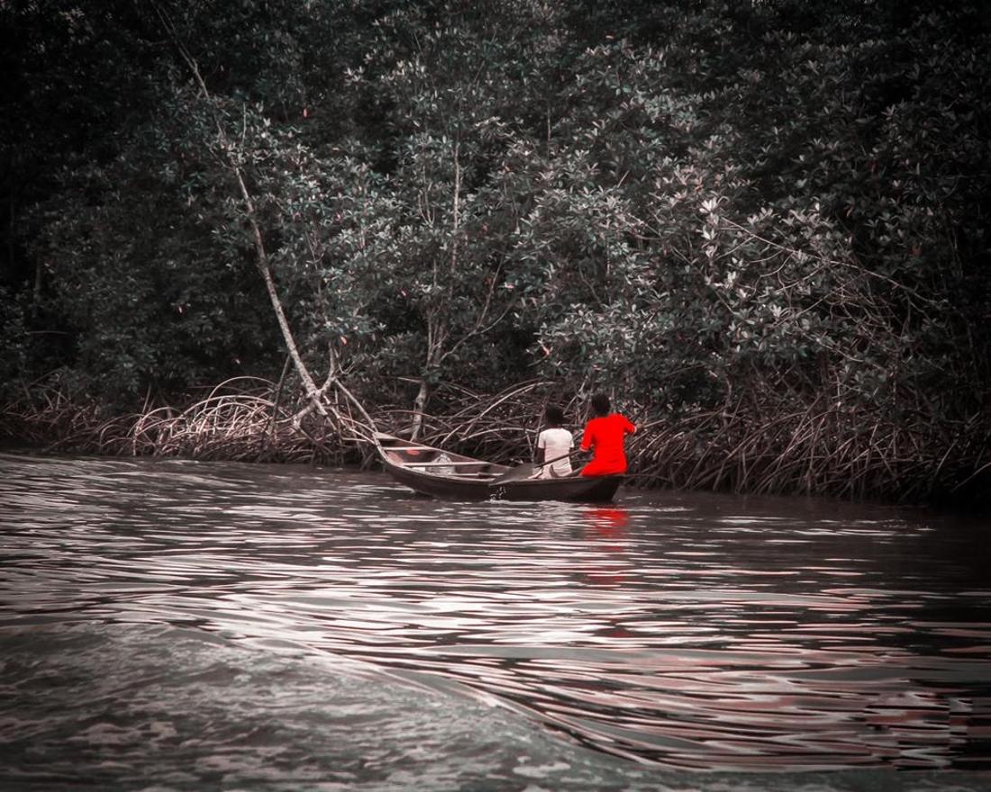 Two in a canoe, in the creeks
